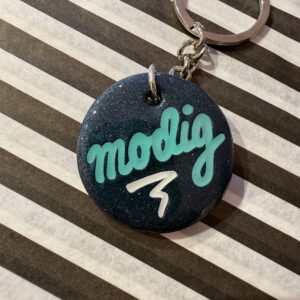 Modig rund sort nøglering