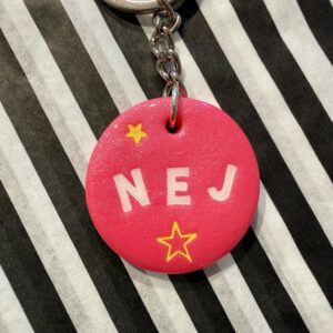 Nej rund pink nøglering